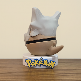 Figurine Pokéball Osselait vue arrière détail sur sa queue