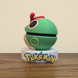 Figurine Pokéball Chenipan : vue arrière, gros plan sur la sphère verte