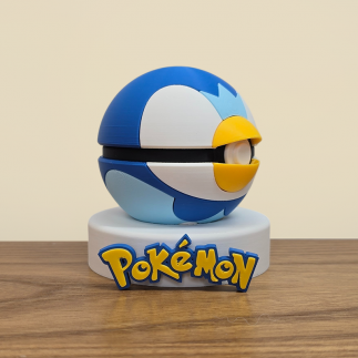 Figurine Pokéball Tiplouf : vue coté droit, détail détail de la pokeball couleurs bleues
