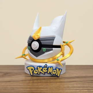 Figurine Pokéball Arceus : Vue de profil détail sur les anneaux couleur or
