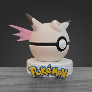 Profil gauche Pokéball Mélodelfe montrant les ailes dorsales et la précision de l'impression 3D.