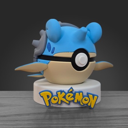 Profil gauche Pokéball Lokhlass montrant le relief de la carapace grise et la précision 3D.