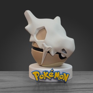 Profil gauche Pokéball Osselait montrant les fissures du crâne et la précision de l'impression 3D.
